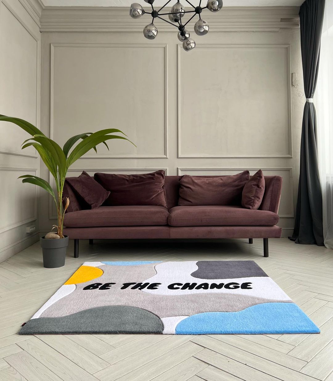 Be The Change Area Rug