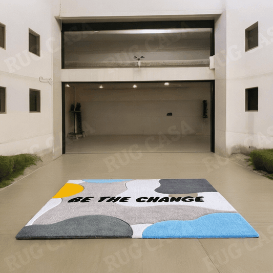 Be The Change Area Rug