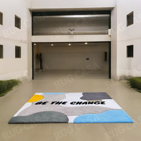 Be The Change Area Rug